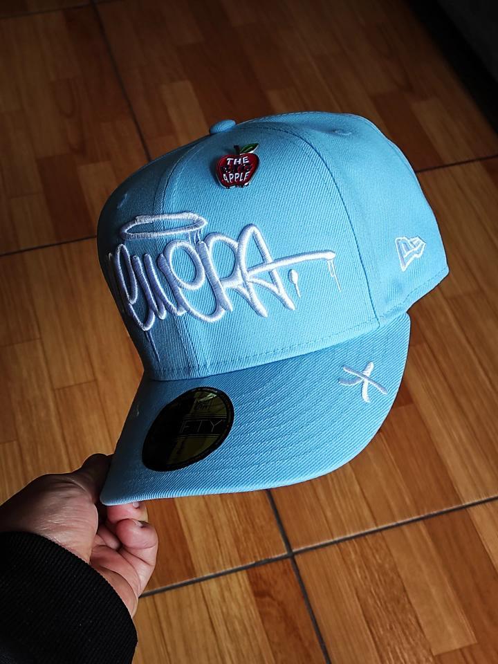59FIFTY new era grafiti SKY BLUE incluye pin