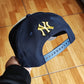 New Era New York Yankees World Series 1999 Gold Navy Two Tone A Frame 9Forty Snapback Hat