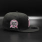 New era Anaheim Angels 50th Aniversario negro rosado 9 Fifty Snapback
