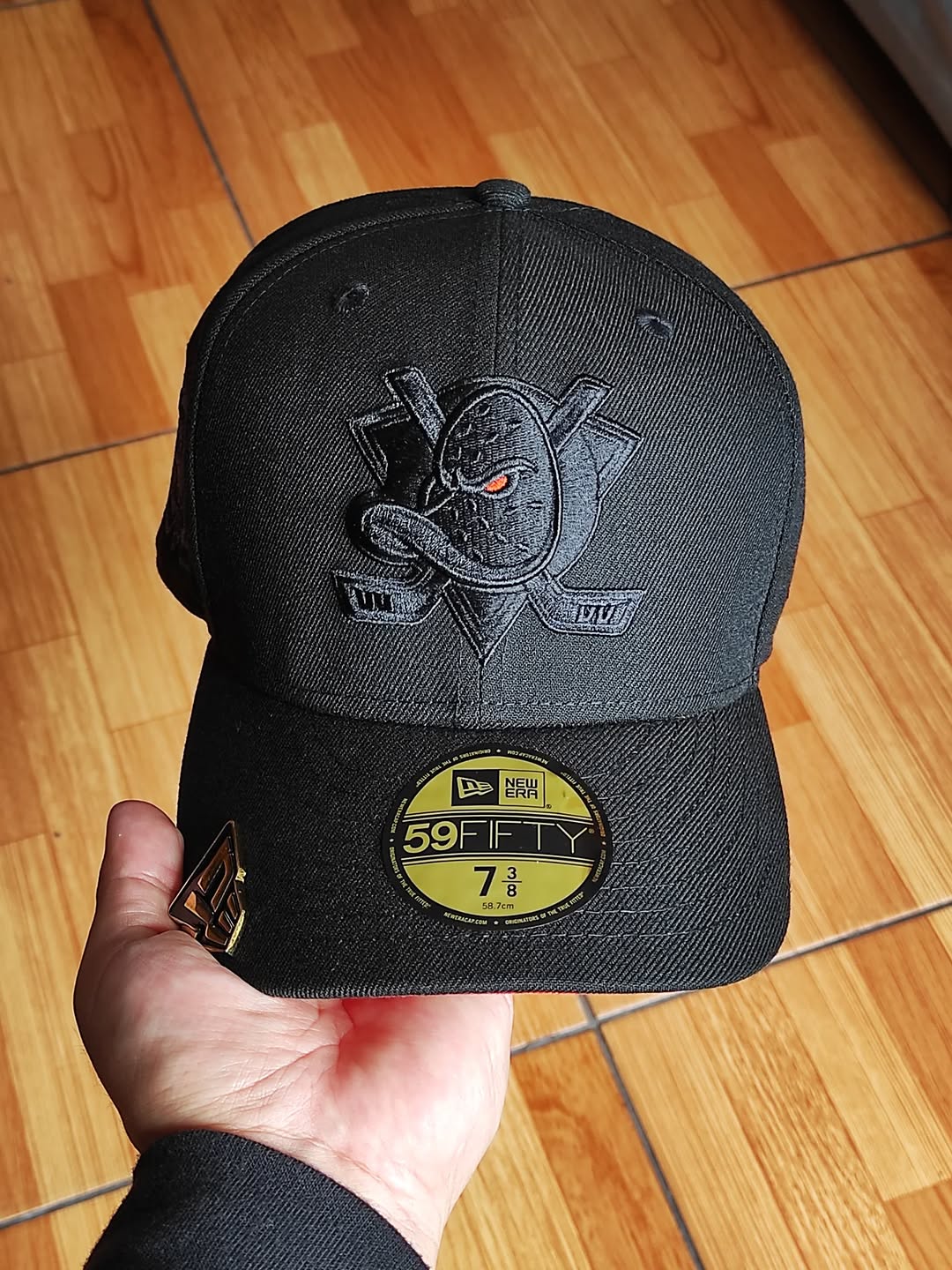 New Era Anaheim Ducks 30th Anniversary Blackout Orange Laser Prime Edition 59Fifty Fitted Hat