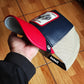 Gorra trucker azul marino y roja gallo Shleather Cock The Farm de Goorin Bros