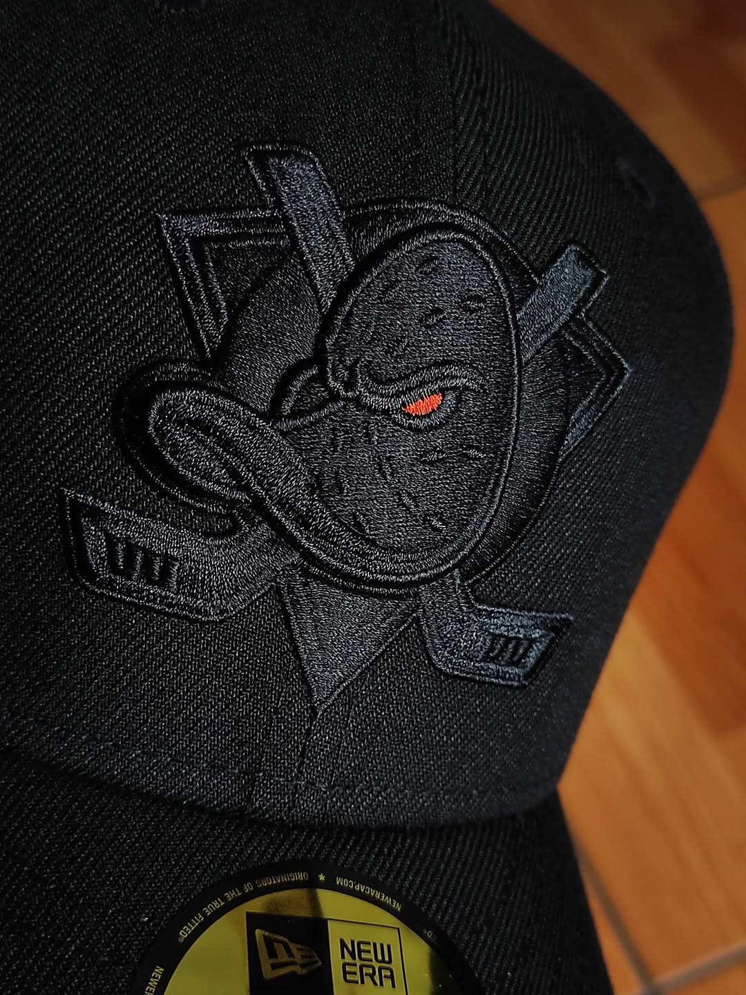 New Era Anaheim Ducks 30th Anniversary Blackout Orange Laser Prime Edition 59Fifty Fitted Hat