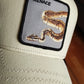 Gorra trucker beige serpiente Menace Deadly Companion Core Canvas The Farm de Goorin Bros