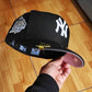 New Era New York Yankees World series 1999 black / pink  59fifty fitted
