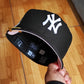 New Era New York Yankees World series 1999 black / pink  59fifty fitted