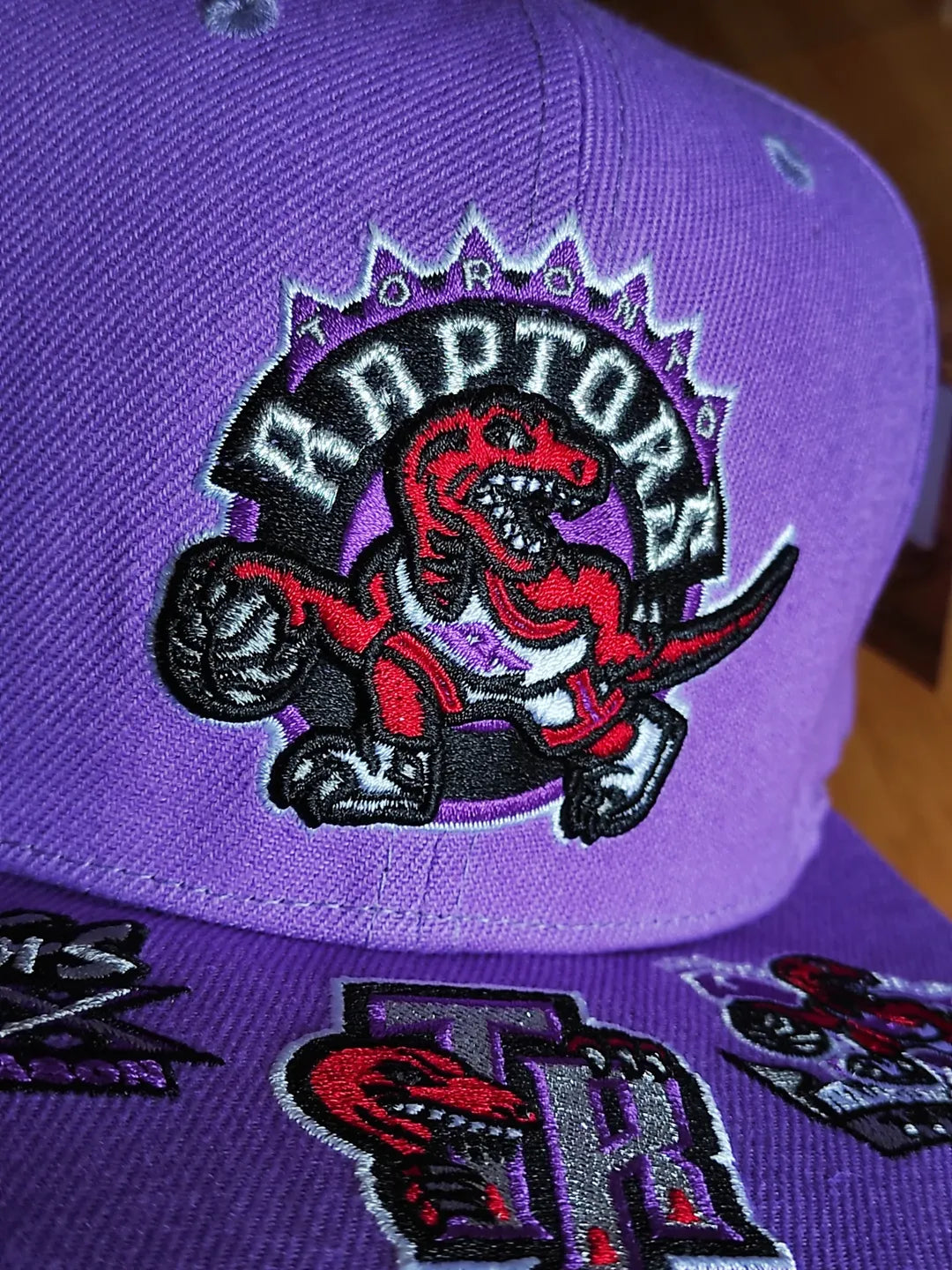 Toronto Raptors Mitchell & Ness NBA FRONT LOADED Snapback Hat- Purple