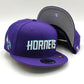 New Era Charlotte Hornets 9Fifty snapback Morada colección jersey